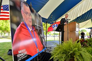 Jeff Whorley glances at a photo of his late uncle, Nobel laureate and MTSU alumnus James M. Buchanan during a special May 2013 celebration of Buchanan's life. (MTSU file photo by J. Intintoli)