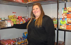 Becca Seul, who oversees the MTSU Student Food Pantry, says she hopes the upcoming C-USA food drive will help stock the pantry shelves in the Student Services and Admissions Center. (Photo by MTSU News and Media Relations)