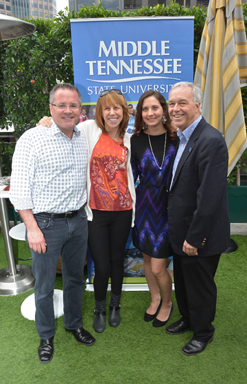 MTSU alum Pete Fisher (left), general manager of the Grand Old Opry, joins Erika Nichols, general manager of Nashville's Bluebird Caf (second from left) and Ken Paulson, dean of the College of Mass Communication (right), in congratulating MTSU alumna Alicia Warwick, executive director of The Recording Academy's Nashville chapter (second from right), at a Saturday, Feb. 7, brunch in Warwick's honor sponsored by MTSU in downtown Los Angeles before the Grammy awards. (MTSU photos by Andrew Oppmann)