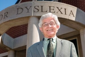 Dr. James “Jim” Herman, director of MTSU’s Center for the Study and Treatment of Dyslexia, pauses outside the center’s entrance on North Baird Lane. (MTSU photo by Darby Campbell)