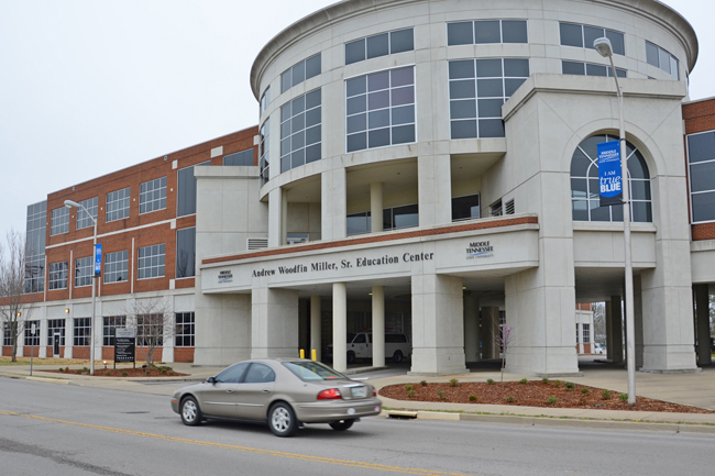 A car passes by the entrance to MTSU's Andrew Woodfin Miller Sr. Education Center, a renovated campus addition that provides needed office and instructional space for some of the university’s key programs, on East Bell Street in Murfreesboro in this file photo. (MTSU file photo)