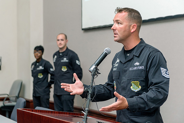 U.S. Air Force tech sergeant Jonathan Billie explains about maneuverability and other aspects of the F-22 Raptor while speaking June 3 in the Business and Aerospace Building's State Farm Lecture Hall.