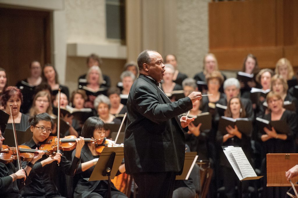 In this file image, Middle Tennessee State University School of Music professor Raphael Bundage conducts the MTSU Schola Cantorum student ensemble, the Middle Tennessee Choral Society and their orchestra in concert at Hinton Music Hall in the university’s Wright Music Building. The Schola Cantorum will present Handel’s “Messiah” Sunday, Nov. 17, at 3 p.m. in Hinton Hall. (MTSU file photo by J. Intintoli)