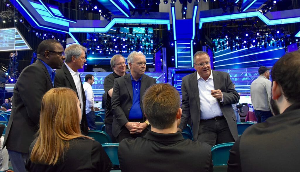 Academy of Country Music CEO and MTSU alumnus Pete Fisher, standing at right, holds a class Sunday, April 15, for five students from MTSU’s Department of Media Arts on the floor of the ACM Awards Show at the MGM Grand Hotel and Casino’s Grand Garden Arena in Las Vegas. From left, facing camera, are MTSU President Sidney A. McPhee, Media Arts Chair Billy Pittard, Media Arts professor Bob Gordon and College of Media and Entertainment Dean Ken Paulson. (MTSU photo by Andrew Oppmann)