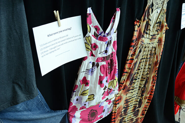 One of the anonymous stories of sexual assault is paired with clothing shown as part of the “What Were You Wearing?” sexual assault awareness exhibit on display April 2-6 in the MTSU Campus Recreation Center lobby. (MTSU photo by Jayla Jackson)
