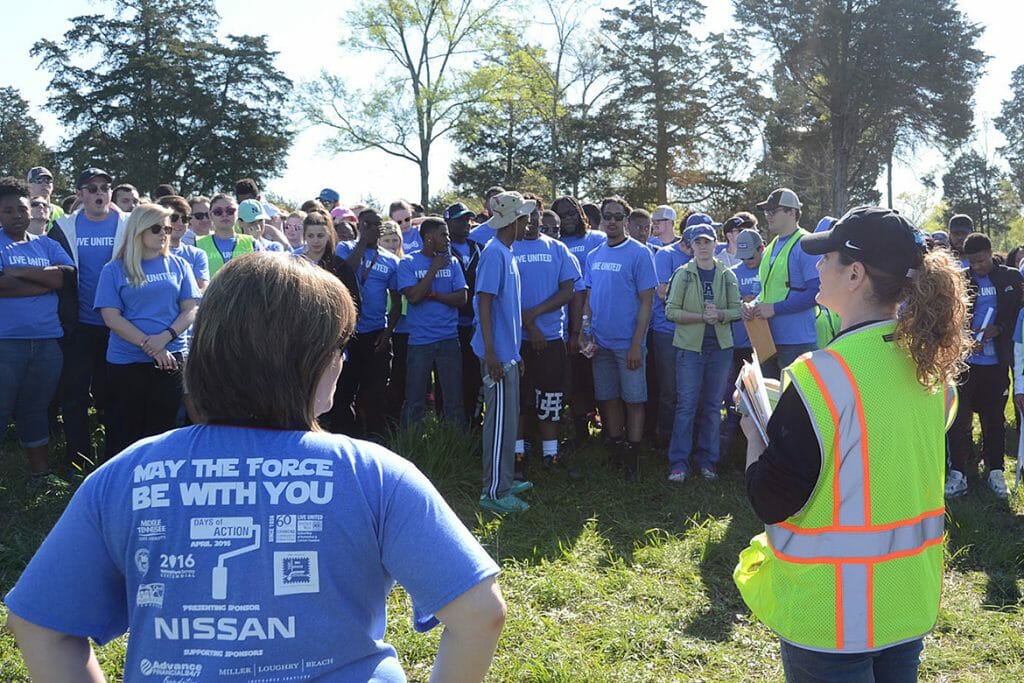 MTSU students get instructions Saturday, April 16, before beginning their work at the BIG Event community service activity at Old Fort Park.