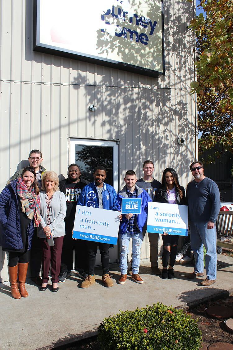 MTSU Fraternity and Sorority Life recently donated $2,478.17 to The Journey Home. The money was raised through a three-day collection in September called “Crash the Commons Change Wars.” Pictured are FLS staff and students with staff of The Journey Home outside its location on West Castle Street. (Submitted photo)