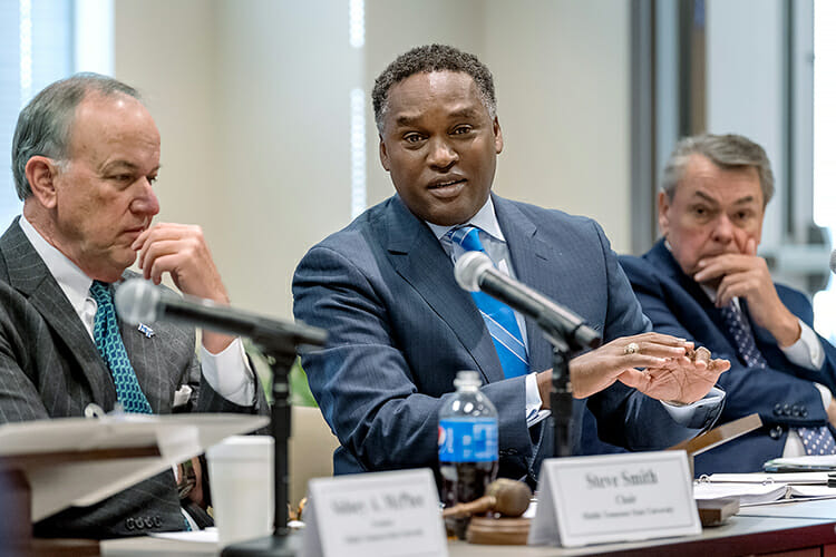 MTSU Board of Trustees Vice Chairman Darrell Freeman Sr., center, makes a point Tuesday, Dec. 11, during the board’s quarterly meeting inside the Miller Education Center on Bell Street. At left is Board Chairman Steve Smith and at right is Trustee Joey Jacobs. (MTSU photo by J. Intintoli)