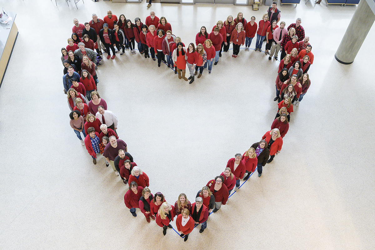 MTSU employees form a human heart.