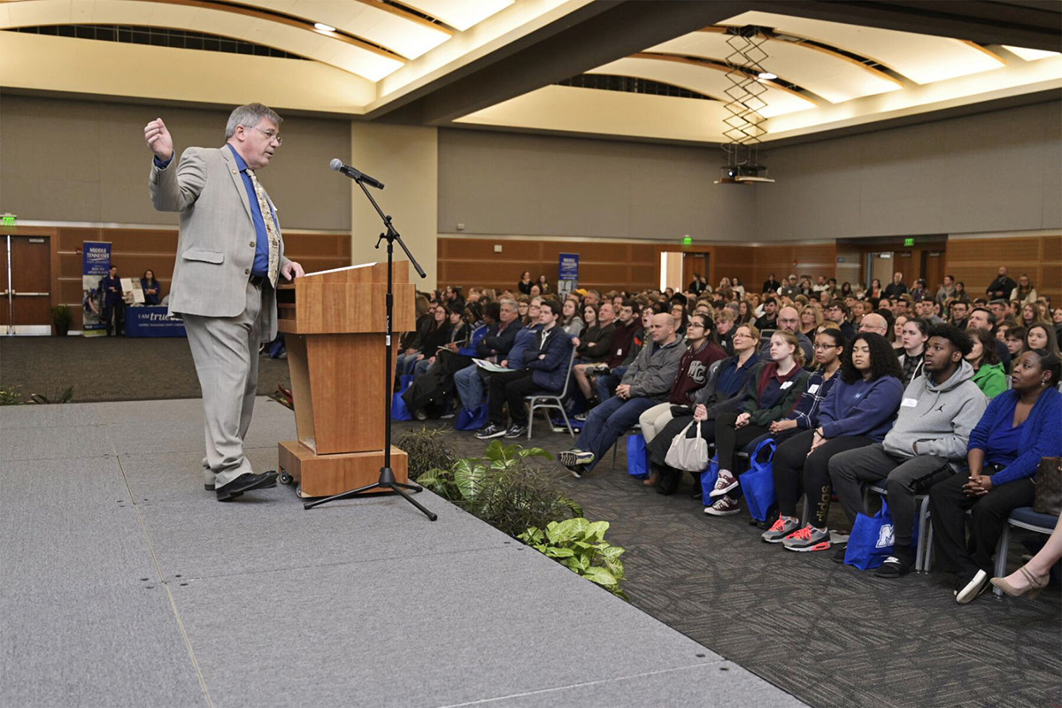 Speaking to a packed crowd of guests, MTSU Dean John Vile discusses the variety of opportunities available to students who are a part of the University Honors College Feb. 18 during the annual Presidents Day Open House. (MTSU photo by Andy Heidt)