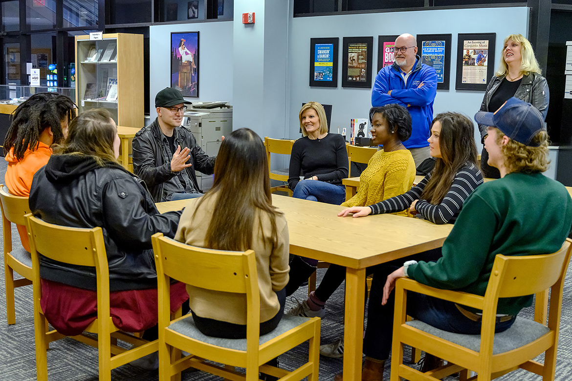 MTSU alumnus and Grammy-nominated songwriter/producer Luke Laird, left in black cap, talks to a group of MTSU recording industry students as NBC Nightly News Sunday anchor Kate Snow, center in black shirt, listens inside the Center for Popular Music in the Bragg Media and Entertainment Building in late January. Standing at right looking on are Andrew Oppmann, MTSU vice president of Marketing and Communications, and Beverly Keel, chair of the Department of Recording Industry. A segment about the recording industry department, its successful alumni and annual Grammy Awards outreach will air Sunday, Feb. 10, before the Grammys telecast on CBS. (MTSU photo by J. Intintoli)