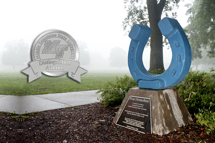 The MTSU Distinguished Alumni Award badge is superimposed over a photo showing the Blue Horseshoe in an early summer fog. (MTSU file photo by Andy Heidt)