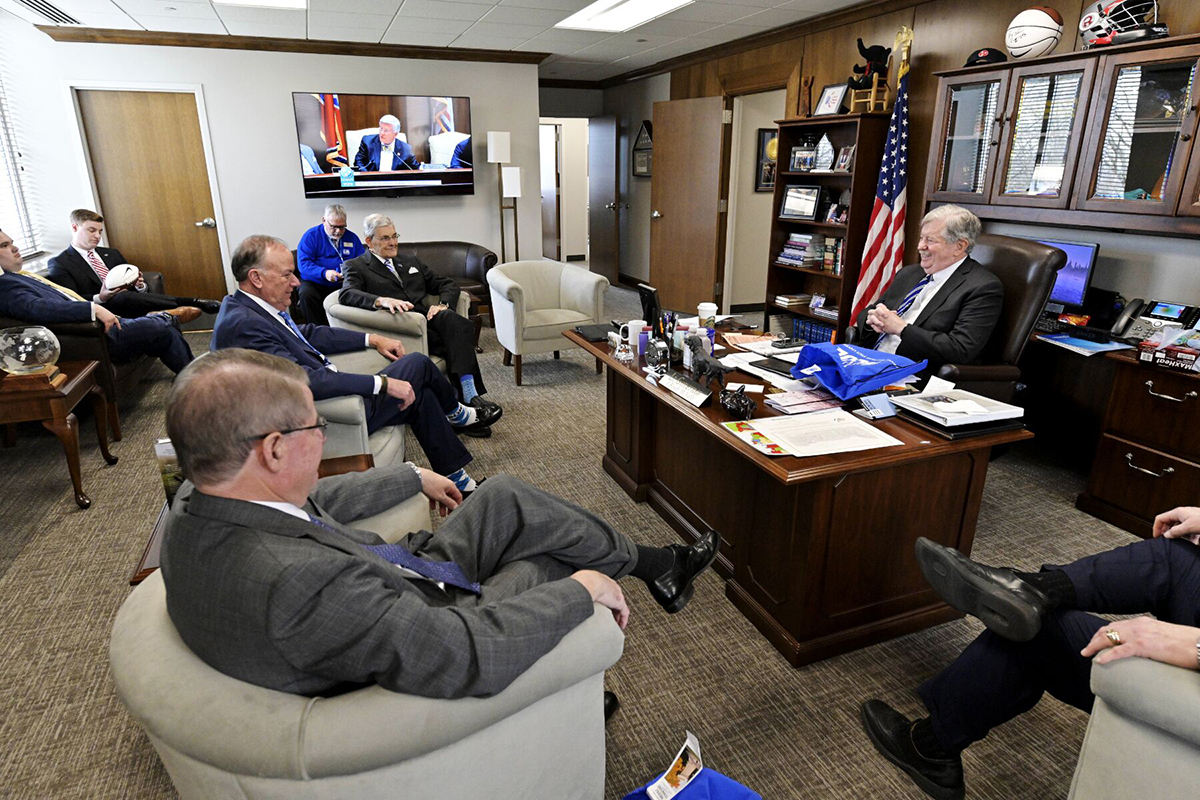 Tennessee Lt. Gov. Randy McNally, right, laughs while carrying on a conversation with MTSU’s Joe Bales, foreground left, vice president of University Advance, and Board of Trustees Chairman Steve Smith March 12 during MTSU Day on the Hill. MTSU officials shared updated information with state legislators during the visit. (MTSU photo by Andy Heidt)