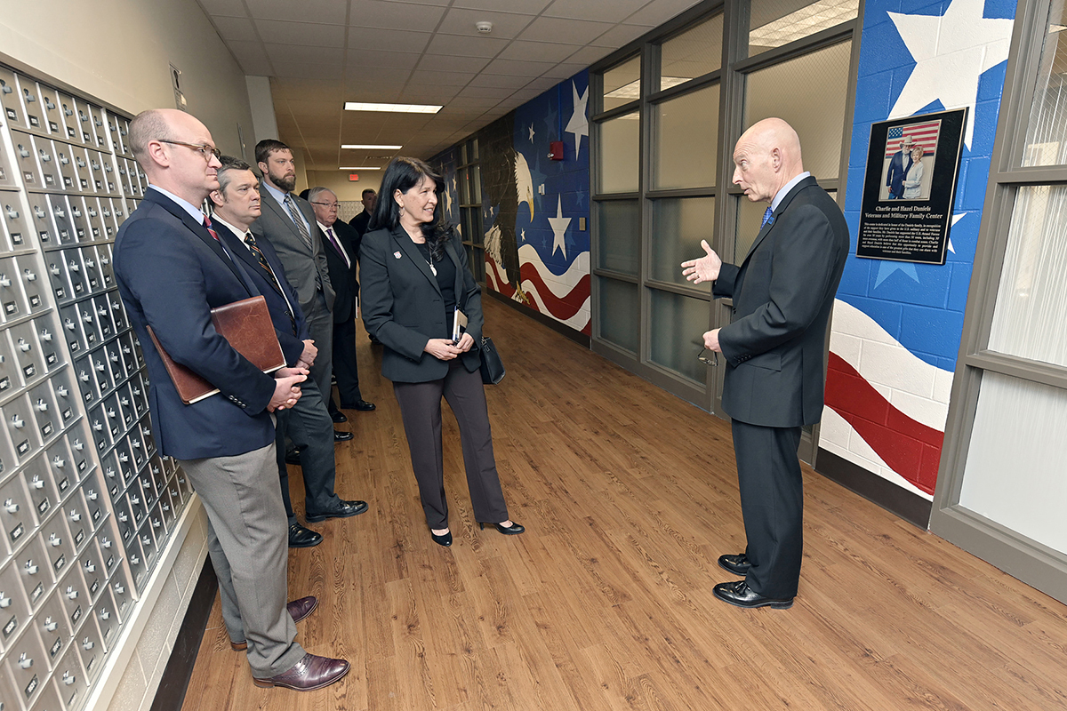 THEC Executive Director Mike Krause, front left, and Tennessee Department of Veterans Services Deputy Commissioner Tilman Goins and Commissioner Courtney Rogers listen as MTSU’s Keith M. Huber, right, provides details about the combined 3,200 square feet of dedicated office space for student veterans in the Charlie and Hazel Daniels Veterans and Military Family Center during a scheduled visit Tuesday (March 26).
