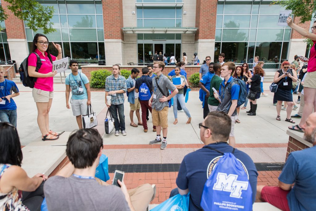 A Student Orientation Ambassador gives CUSTOMS students and their parents a tour of MTSU's campus. Groups are assigned to a specific "country," and these students develop friendships over the course of the CUSTOMS orientation experience. (MTSU photo by Kimi Conro)