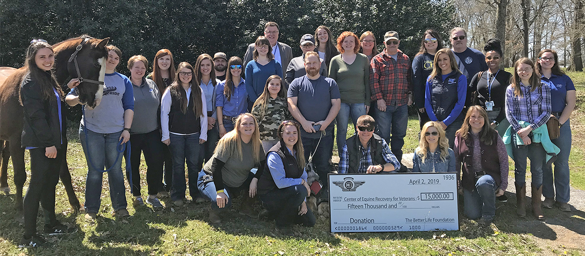 When Brad and Jen Arnold recently presented a $15,000 check from his band 3 Doors Down and the group’s Better Life Foundation to assist with equine therapy for veterans, they were joined by MTSU horse science students, faculty and staff, veterans and officials with the Veterans Recovery Center. 