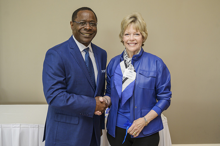 MTSU President Sidney A. McPhee, left, shakes hands with Delia Goodman, a Signal Society donor, at the seventh annual 1911 Society Luncheon held April 11 at the Stones River Country Club in Murfreesboro. The luncheon honors longtime and estate plan donors to MTSU. (MTSU photo by Andy Heidt)