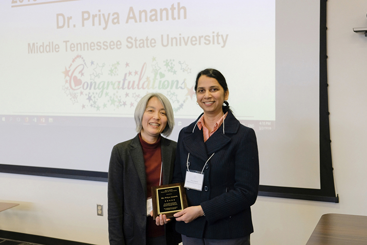 Dr. Priya Ananth, right, an associate professor of Japanese in the Department of World Languages, Literatures and Cultures at MTSU, receives the 2019 Teacher of the Year Award from the Southeastern Association of Teachers of Japanese, or SEATJ, at the group’s March conference at Wake Forest University in North Carolina. (Submitted photo)