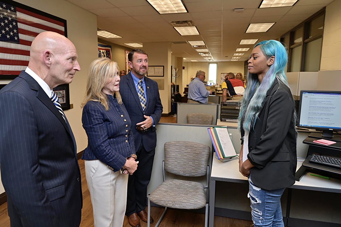 Kwantisha Avila, right, a sophomore criminal justice major from Austin, Texas, shares about her student-veteran life and that of a former U.S. Marine sergeant to Keith M. Huber, left, U.S. Sen. Marsha Blackburn and John Clement, field director in Blackburn’s office, during a Friday, June 21, visit to MTSU. (MTSU photo by Andy Heidt)