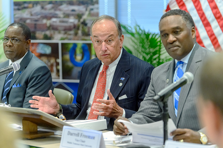 MTSU Board of Trustees Chairman Stephen Smith, center, makes a point Tuesday, June 18, during the board’s quarterly meeting inside the Miller Education Center on Bell Street. Seated next to him are MTSU President Sidney A. McPhee, left, and board Vice Chairman Darrell Freeman Sr. (MTSU photo by J. Intintoli)