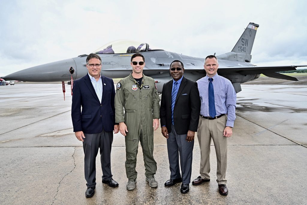 The U.S. Air Force’s Air Combat Command F-16 Viper Demonstration Team hosted an MTSU contingent for the final practice Friday before the Great Tennessee Air Show this weekend at Smyrna Airport. Pictured, from left, are University Provost Mark Byrnes; U.S. Air Force Maj. Garret Schmitz, commander of the Viper team; MTSU President Sidney A. McPhee; and Alan Thomas, MTSU vice president for business and finance. (MTSU photo by J. Intintoli)
