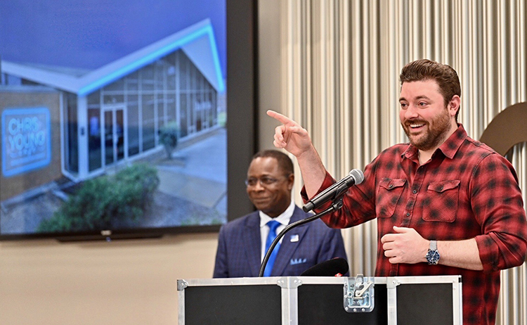 Multi-platinum country artist Chris Young, a former MTSU student, talks Tuesday July 9, about his decision to support the creation of a new live performance venue on the Murfreesboro university’s campus, as President Sidney A. McPhee looks on. (MTSU photo by J. Intintoli)