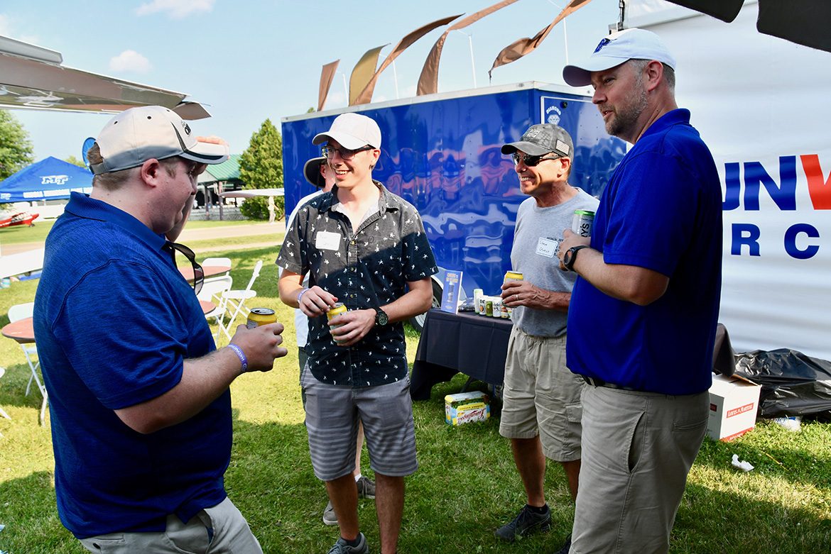 About 50 alumni from MTSU’s Aerospace Department attended a special event Wednesday night on the grounds of EAA AirVenture, the largest air show of its kind in the world. (MTSU photo by Andrew Oppmann)
