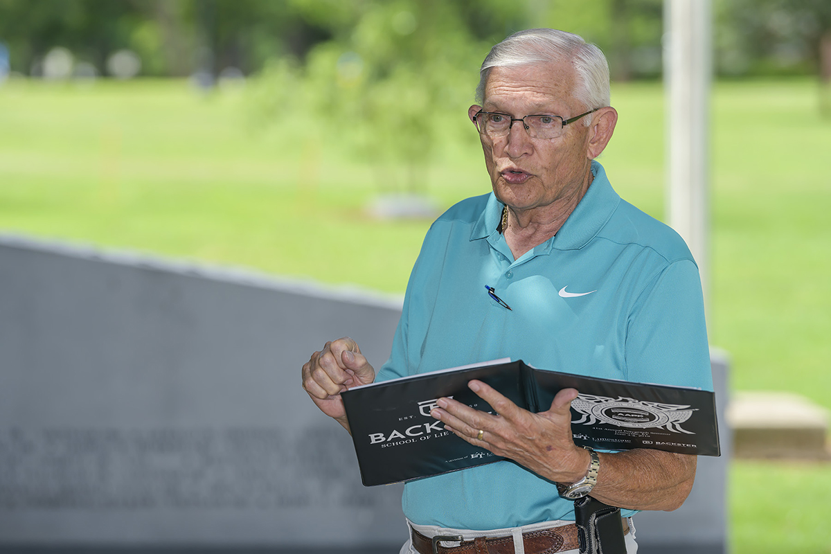 Joe Hager of Bradenburg, Ky., shares some of the historical perspective about the life and death of Jimmy Schleicher, a graduate of Middle Tennessee State College and fallen WWII pilot. More than 20 members of the Schleicher family gathered Saturday, July 13, at the MTSU Veterans Memorial site for a Gold Star family reunion and special brick presentation on the MTSU campus. (MTSU photo by Andy Heidt)