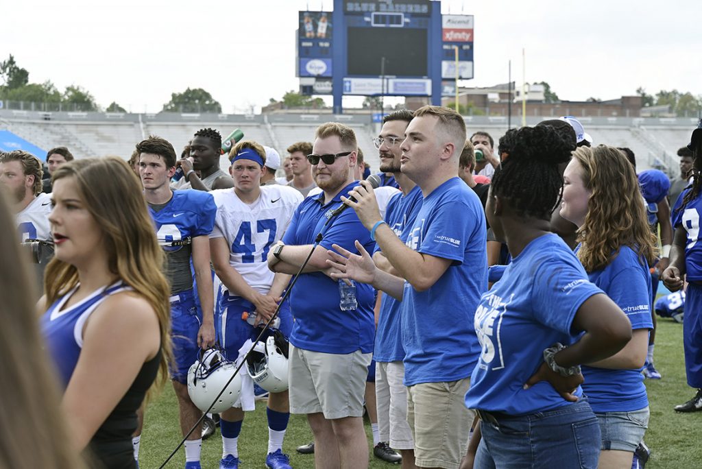 Kobe Hermann, president of the Blue Zoo, the newly revived student pep group at MTSU, speaks to the more than 300 students assembled Tuesday, Aug. 13, at Floyd Stadium to unfurl the organization’s banner for the first time. (MTSU Photo by Andy Heidt)