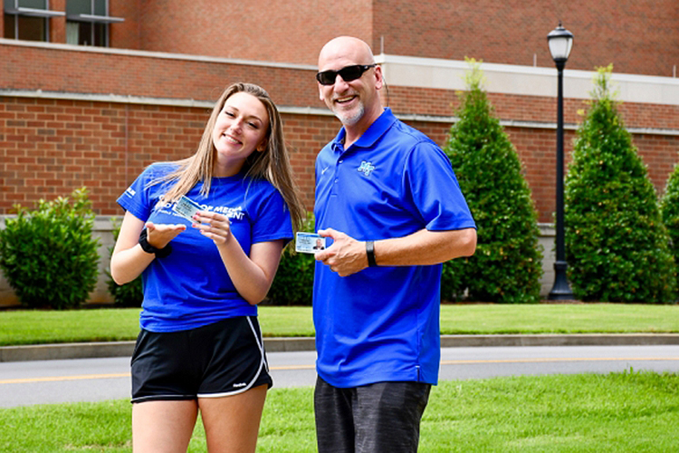 MTSU adult learner Chuck Searles, right, is shown with his daughter, Madisyn, a dual enrollment student and rising senior at Independence High School, on the MTSU campus. Chuck enrolled in MTSU’s Applied Leadership Program this year while his daughter is taking a digital arts course to earn high school and college credit. (MTSU photo by Hunter Patterson)