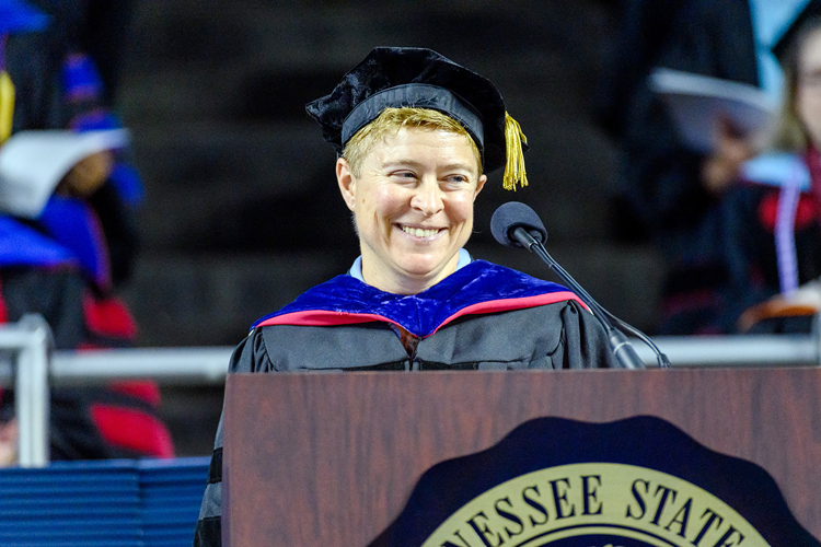 MTSU history professor Pippa Holloway grins at the audience’s response to her remarks at the university’s summer 2019 commencement ceremony Saturday, Aug. 10, in Murphy Center. Holloway, the 2018-19 MTSU Faculty Senate president, was guest speaker for the event, which featured presentations of 817 degrees to 603 undergrads and 214 graduate students. (MTSU photo by J. Intintoli)
