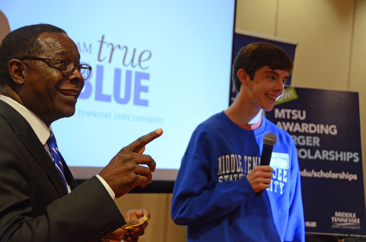 As a high school junior in October 2018, Jack Medley, right, told MTSU True Blue Tour audience members at the Louisville, Ky., True Blue Tour stop things about the Murfreesboro university’s aerospace program that he wanted to be a part of that pleased MTSU President Sidney A. McPhee. (MTSU file photo by Randy Weiler)