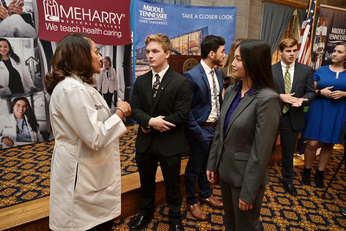 Dr. Veronica Mallett, left, dean of Meharry’s School of Medicine in Nashville, Tenn., chats with MTSU students Pierce Creighton, center, and Maria Hite, at a special ceremony Thursday, Oct. 3, at the state Capitol. The students were among six recognized for their acceptance into the inaugural class of the Medical School Early Acceptance Program, a partnership between MTSU and Meharry Medical College to fast-track students to a medical degree in seven years through course work at both institutions. (MTSU photo by Andy Heidt)