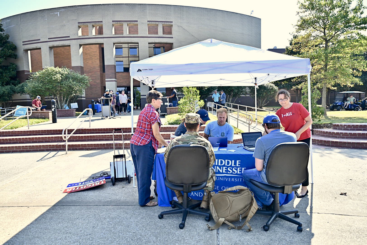 This voter registration table near the Bragg Media and Entertainment Building was among multiple locations set up Tuesday, Sept. 17, across campus as part of MTSU 2019 Constitution Day celebration. (MTSU photo by J. Intintoli)