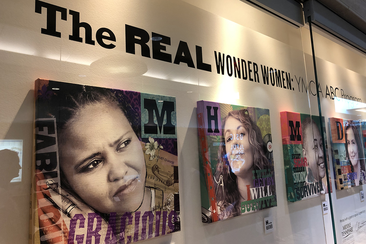 "The Real Wonder Women: YMCA ABC Program" exhibit wall is shown at Nashville International Airport. Leslie Haines, a visual communication professor in the MTSU School of Journalism and Strategic Media and breast cancer survivor, created a series of 12 portrait illustrations of fellow survivors who participated in the YMCA program. The exhibit will be on display until late February. (Submitted photo)