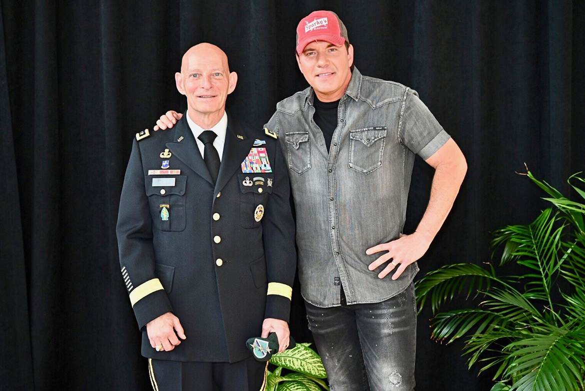 MTSU veterans adviser and retired Lt. Gen. Keith M. Huber, left, poses with country music entertainer Rodney Atkins after the musician’s announcement of a Sept. 11, 2020, concert in Murphy Center to commemorate Daniels Veterans Center’s 9/11 Remembrance activities in 2020. They attended this year’s 9/11 ceremony in the Miller Education Center atrium. Tickets for the concert went on sale this week. (MTSU file photo by J. Intintoli)