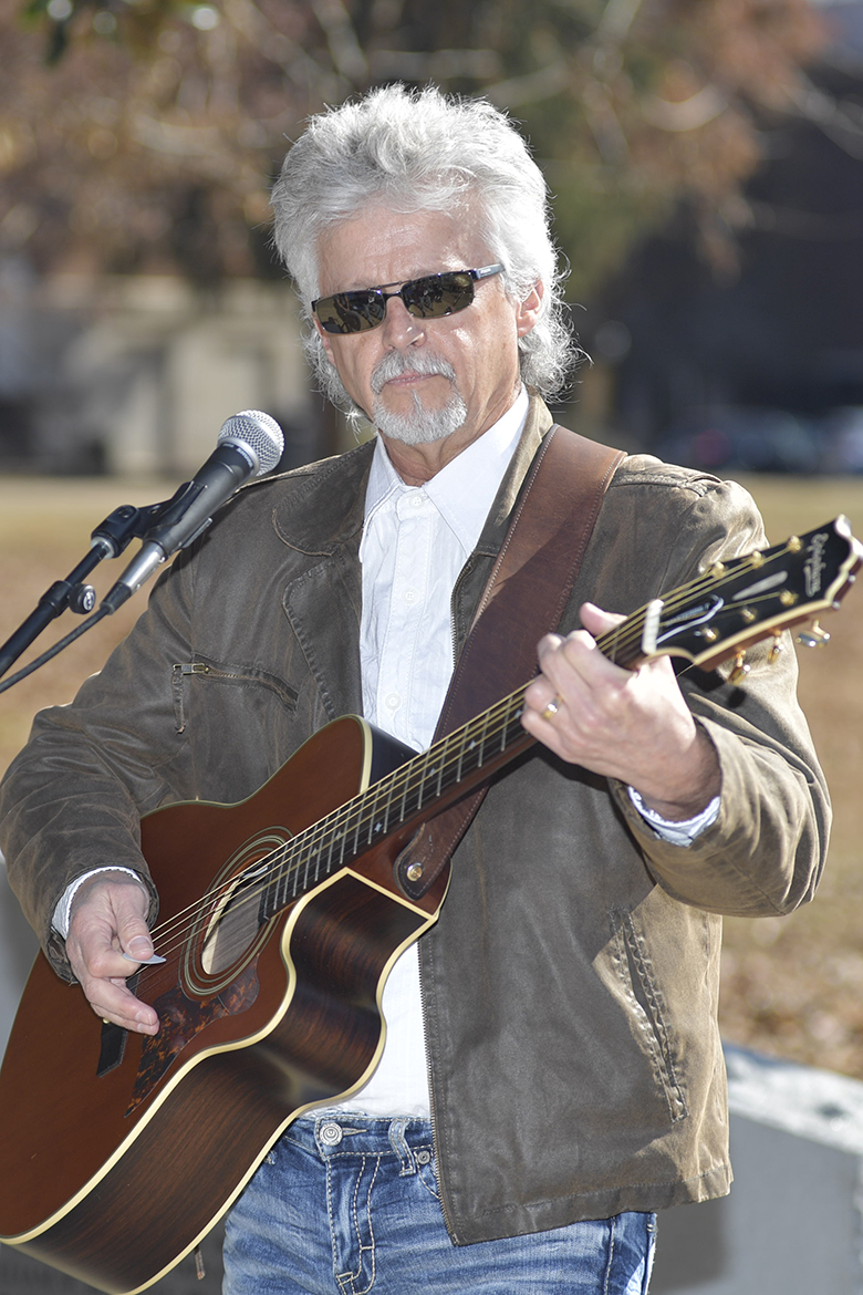 Songwriter Steve Dean of Goodlettsville, Tenn., performed “Screaming Eagle,” a song he co-wrote with the late Blake Pickel, an MTSU alumnus who died in September after survival training exercises, bringing tears to an MTSU Veterans Memorial service audience Saturday, Nov. 16. (MTSU photo by Cat Curtis Murphy)