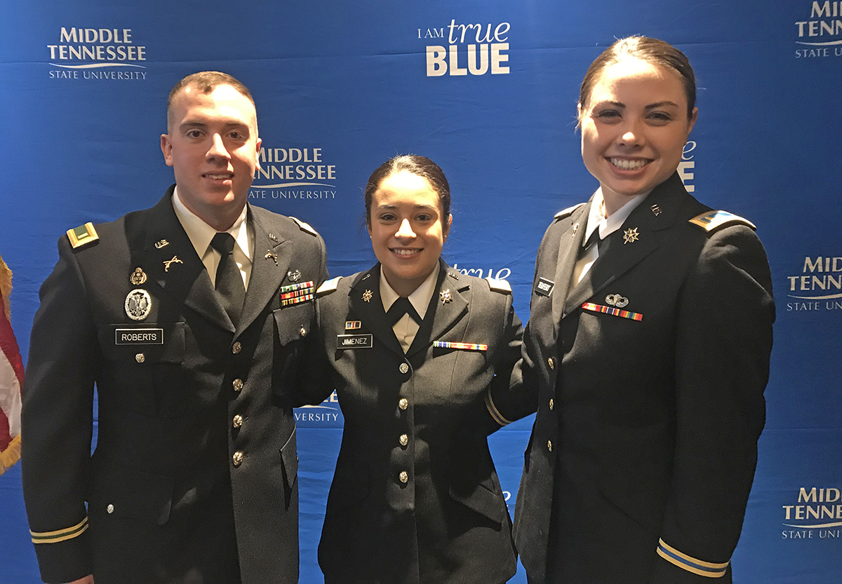 MTSU’s Ethan Roberts, left, of Dickson, Tenn., Neily Jimenez of Christiana, Tenn., and Rachel Teufert of Woodbridge, Va., pose after being commissioned as second lieutenants in a special military science ceremony Dec. 13 in the James Union Building’s Hazlewood Dining Room. They graduated from MTSU Dec. 14. (MTSU photo by Randy Weiler)