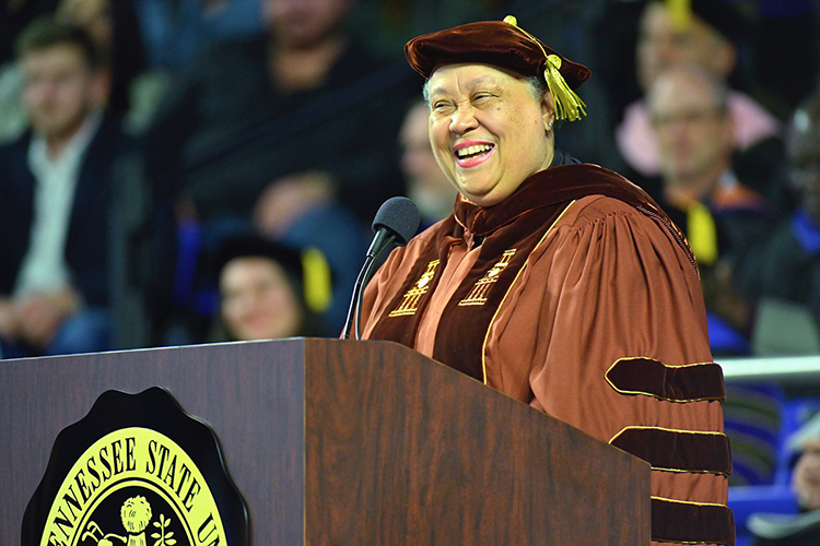 Dr. Belle Wheelan, president and CEO of the Southern Association of Colleges and Schools Commission on Colleges, chuckles as students at MTSU's fall 2019 afternoon commencement ceremony shout "hallelujah!" with her encouragement inside Murphy Center on Saturday, Dec. 14. MTSU presented 1,759 undergraduate and graduate degrees in two ceremonies concluding the fall 2019 semester. (MTSU photo by Cat Curtis Murphy)