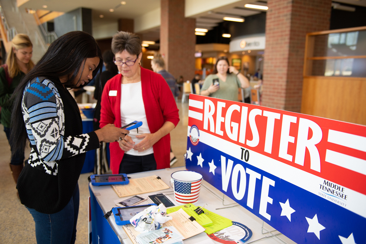 MTSU accounting professor Lara Daniel, right, helps student Kara Lillard with voter registration Feb. 3 in the Student Union as part of the university’s kickoff of 2020 Black History Month activities. Daniel is representing the MTSU chapter of the American Democracy Project. MTSU is hosting the daylong 2020 Middle Tennessee Campus Civic Summit Friday, Feb. 21, in the Student Union Ballroom, where free workshops, panel events and lectures will be aimed at helping increase students' civic engagement.(MTSU file photo by James Cessna)