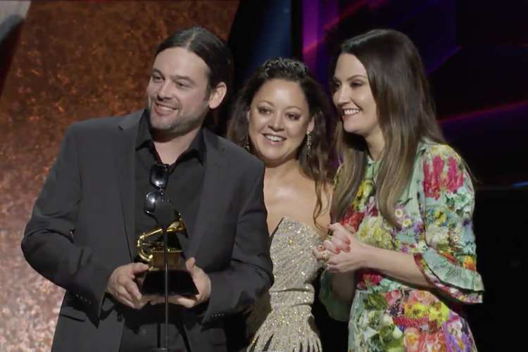 MTSU alumnus Aaron Raitiere, left, looks offstage Sunday night, Jan. 26, while thanking producer Dave Cobb for his help on the Grammy-winning best song for visual media, “I’ll Never Love Again” from “A Star is Born," as his co-writers Hillary Lindsey, center, and Natalie Hemby listen at the Grammy Premiere Ceremony at the Staples Center in Los Angeles. The fourth co-writer, Lady Gaga, isn't pictured; the award was presented before the main televised ceremony. (Photo courtesy of Grammy.com)
