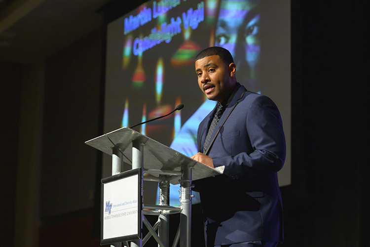 Daniel Green, director of MTSU’s Office of Intercultural and Diversity Affairs, serves as emcee Monday, Jan. 20, at the 2020 Martin Luther King Jr. Day Candlelight Vigil hosted by Middle Tennessee State University inside the Student Union Ballroom. (MTSU photo by Cat Curtis Murphy)
