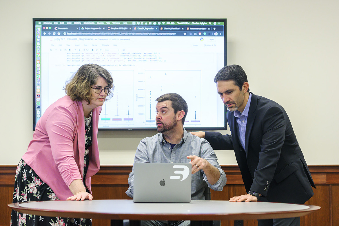 MTSU’s Lisa Green, left, interim chair of the Department of Mathematical Sciences; Ryan R. Otter, biology professor; and Charlie Apigian, information systems and analytics professor, discuss the university's data science program. Apigian and Otter are co-directors of the university’s Data Science Institute, and all three are key faculty in MTSU’s new Tennessee Data Initiative, which includes a new bachelor’s degree in data science available starting in fall 2020. (MTSU photo by Cat Curtis Murphy)