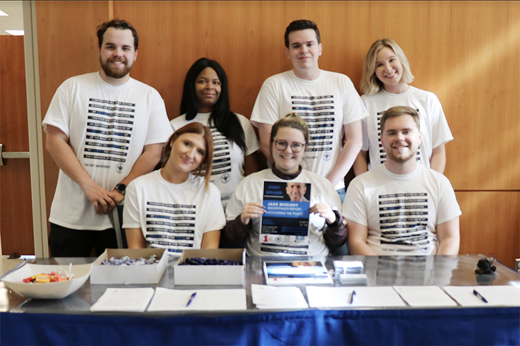 MTSU public relations students pose for a photo before a November 2019 seminar they promoted as part of their award-winning "1 for All @ MTSU: Freedom Comes First" campaign to educate their peers about the First Amendment. Seated from left are Katelyn Compton of Nolensville, Tenn.; Hannah Field of Murfreesboro; and Grant Thompson, a Shelbyville, Tenn., native who now lives in Antioch, Tenn. Standing behind them, from left, are classmates James Whitaker of Murfreesboro; Kintea Webster of Nashville; Jacob West of Gallatin, Tenn.; and Delaney Johnson of Smithville, Tenn. Not pictured are classmates Donivous Odom and Ashley Carman, both of Murfreesboro. The nine-member team recently received two 2020 Parthenon Awards from the Nashville chapter of the Public Relations Society of America for their “shoestring budget” project. (Photo submitted)