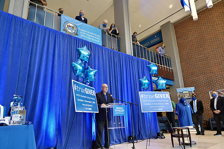 Andrew Oppmann, vice president of marketing and communications and spokesperson for the 2020-21 MTSU Employee Charitable Giving Campaign, gives remarks during the recent campaign kickoff in the atrium of the Cope Administration Building as other campaign volunteers look on. (MTSU photo by Andy Heidt)