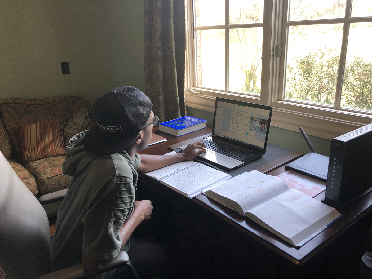 MTSU junior psychology major Chuka Onuh of Franklin, Tenn., tutors a student from his home. Onuh, who is minoring in biology and chemistry, also is an undergraduate researcher and tutors young children at Kumon Tutoring Center in Franklin.(Submitted photo)