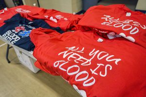 American Red Cross T-shirts reading “All You Need is Blood” await donors at MTSU’s 2020 “Bleed Blue” blood drive last September in this file photo at the neighboring North Boulevard Church of Christ gymnasium. The MTSU Red Cross Club's spring 2021 blood drive is set Monday, April 5, at the same site. (MTSU file photo by Andy Heidt)