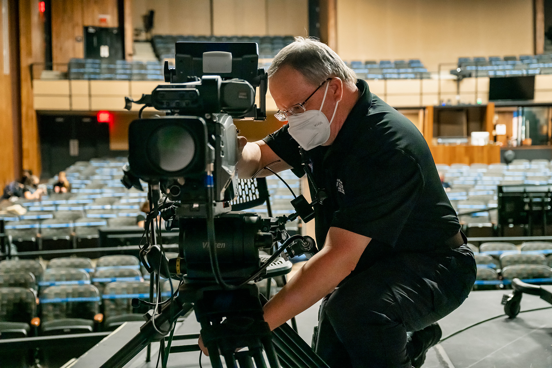 MTSU Department of Media Arts professor Robert "Bob" Gordon Jr. checks a camera placement while working with students in Tucker Theatre to record the MTSU Dance Theatre's 2020 Fall Dance Concert for broadcast Saturday, Nov. 21. (MTSU photo by Andy Heidt)