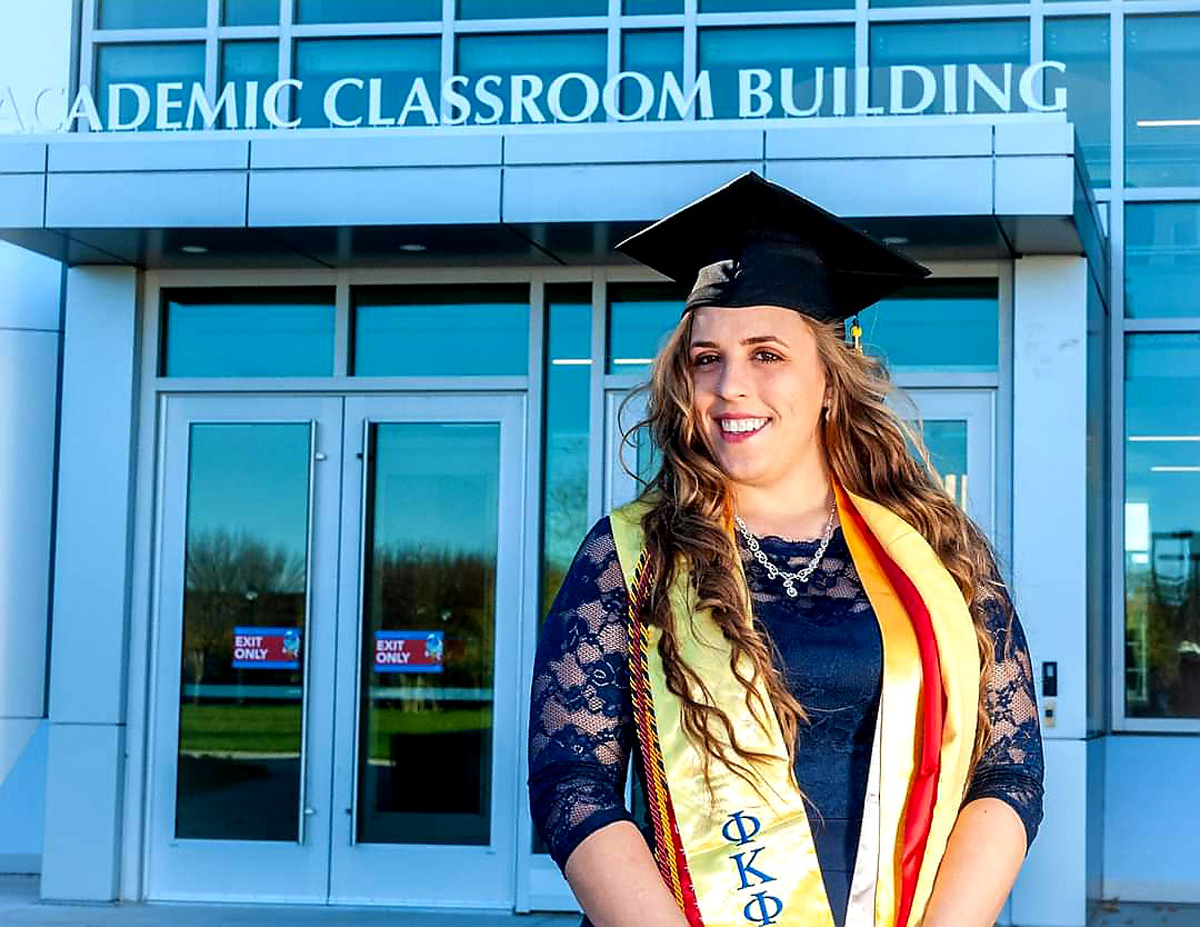 In front of the new Academic Classroom Building, MTSU graduating veteran Karlie Franks of Shelbyville, Tenn., earned her bachelor’s degree in social work and plans to begin her master’s in social work at the university next summer. She served more than three years in the U.S. Army. (Submitted photo by Merle Perkins)
