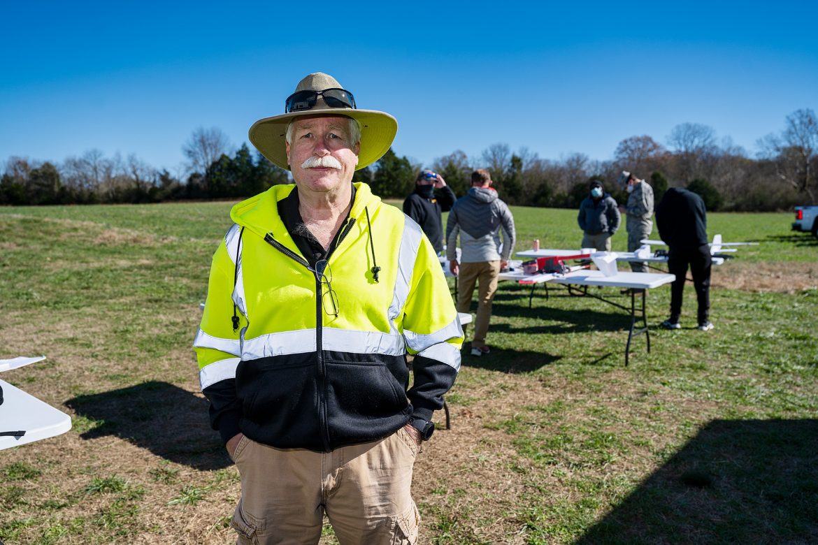 Kevin Corns, Aerospace faculty, with students flying their Unmanned Aerial System aircraft at the MTSU Farm. (Photo: Andy Heidt)